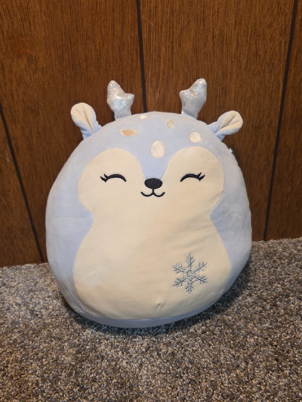 Squishmallows Farryn the Purple Fawn with Snowflake plush. 